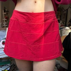 lululemon pace rival mid rise skort in deep red in size 8